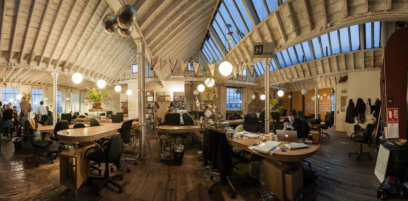 A conversation around a coworking table